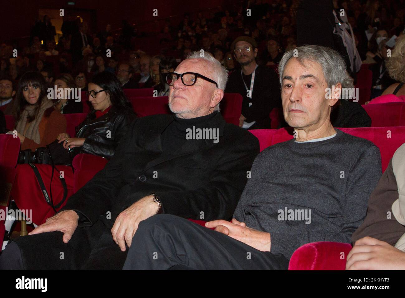 Torino, Italy. 25th November 2022. British actor Malcolm McDowell (left) with film director David Grieco (right) attend the opening event of 2022 Torino Film Festival at Teatro Regio, Torino. Credit: Marco Destefanis/Alamy Live News Stock Photo