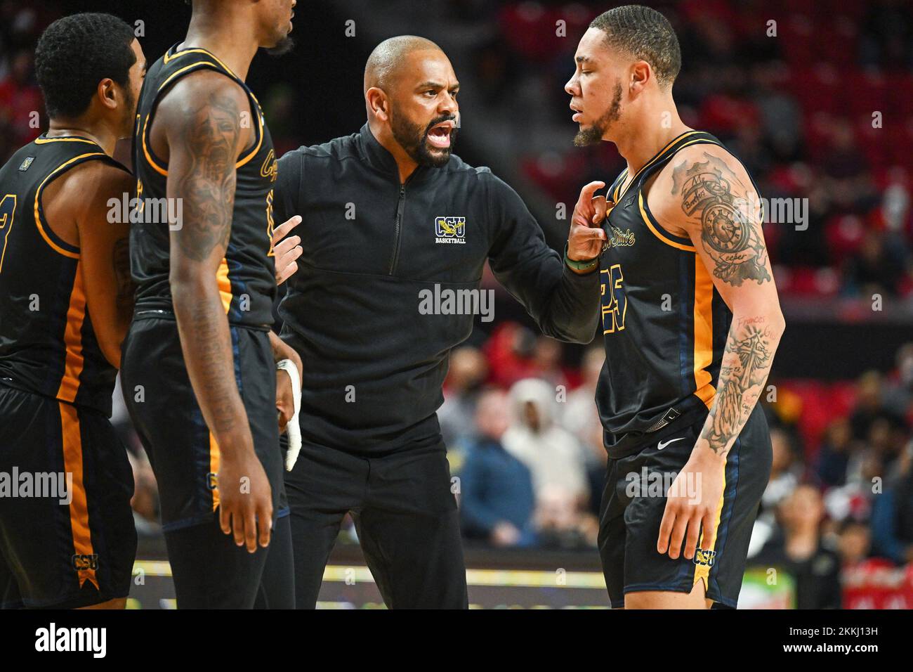 November 25, 2022: Coppin State Eagles head coach Juan Dixon talks to his  team after a technical foul was called during the NCAA basketball game  between the Maryland Terrapins and the Coppin