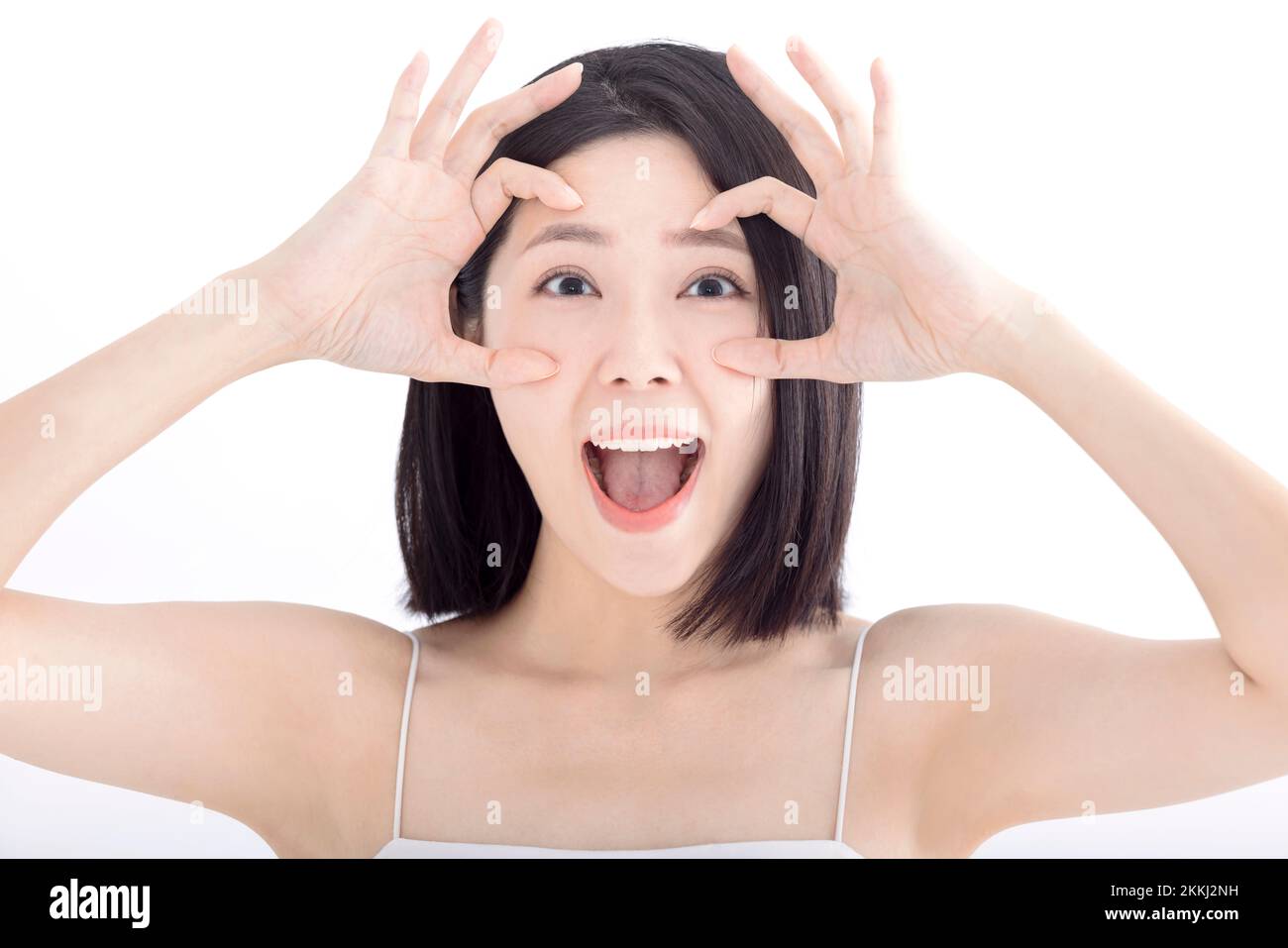 Happy Young woman with Closeup and eye looking gesture Stock Photo