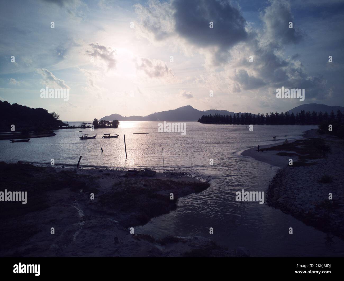 aerial scene of the cloudy evening sky at the beach Stock Photo - Alamy
