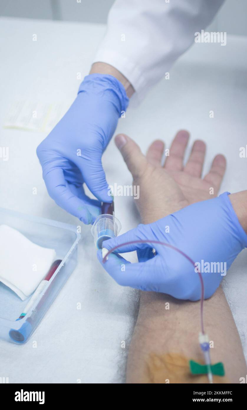 Taking blood sample Stock Photo Alamy