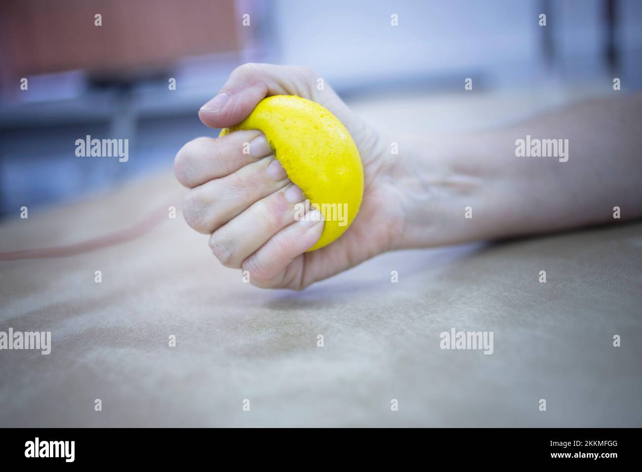 Patient squeezing physiotherapy ball Stock Photo Alamy