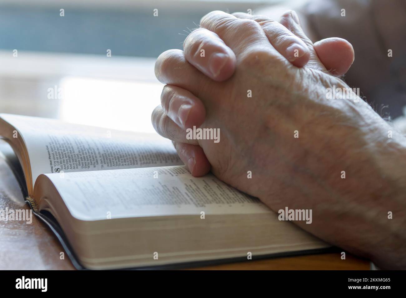 Close-up of praying hands Stock Photo