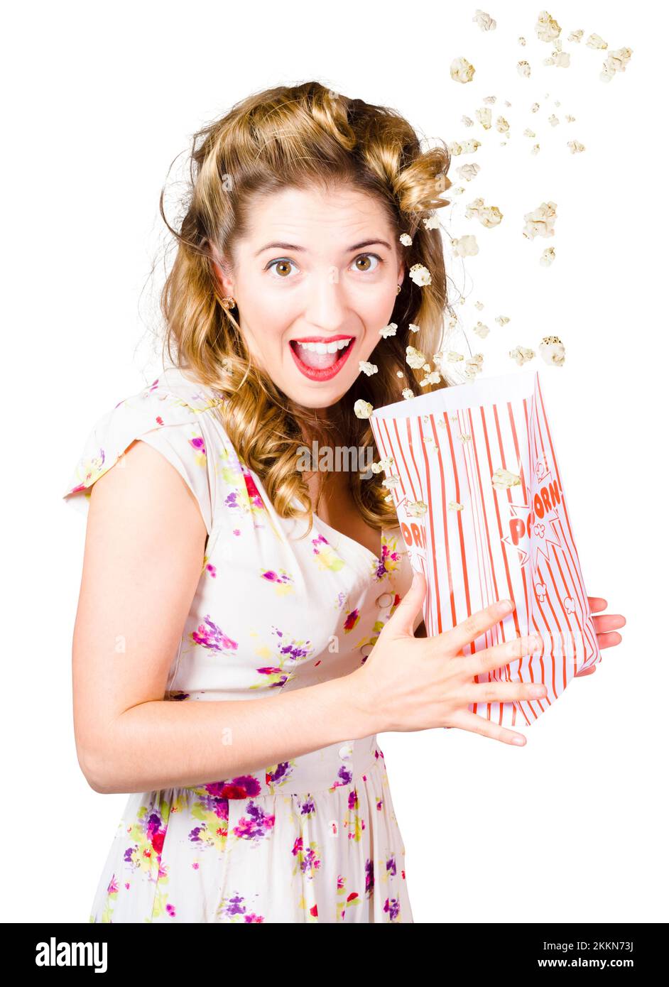 Funny shock horror pinup girl holding bag of popcorn bag when watching