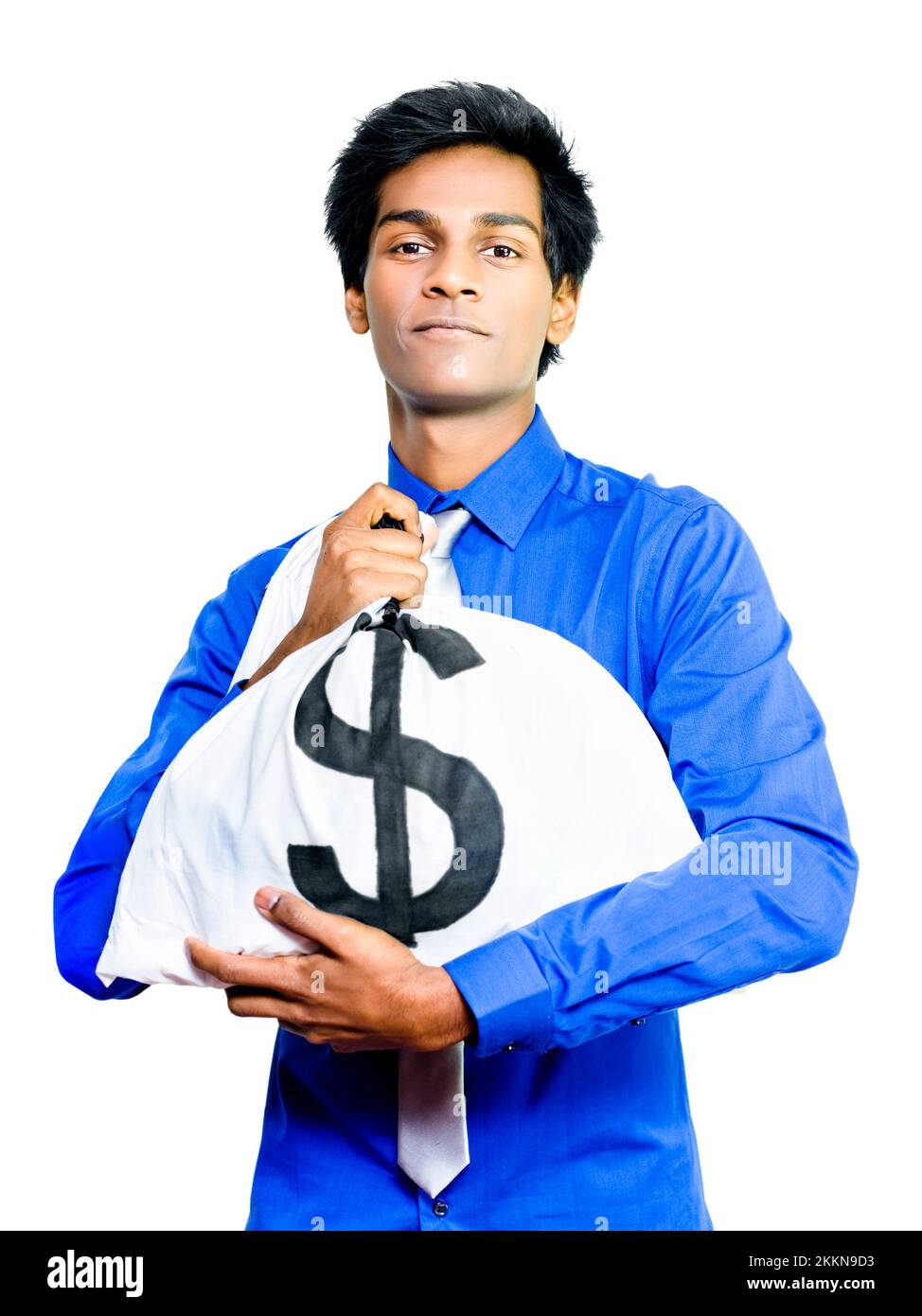 A young Asian busness man hugs a large money bag full of dollars