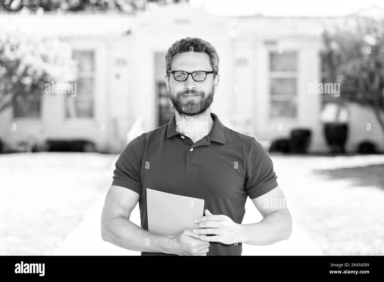 arrogant man in eyeglasses hold paper. vision acuity. eyesight. vision