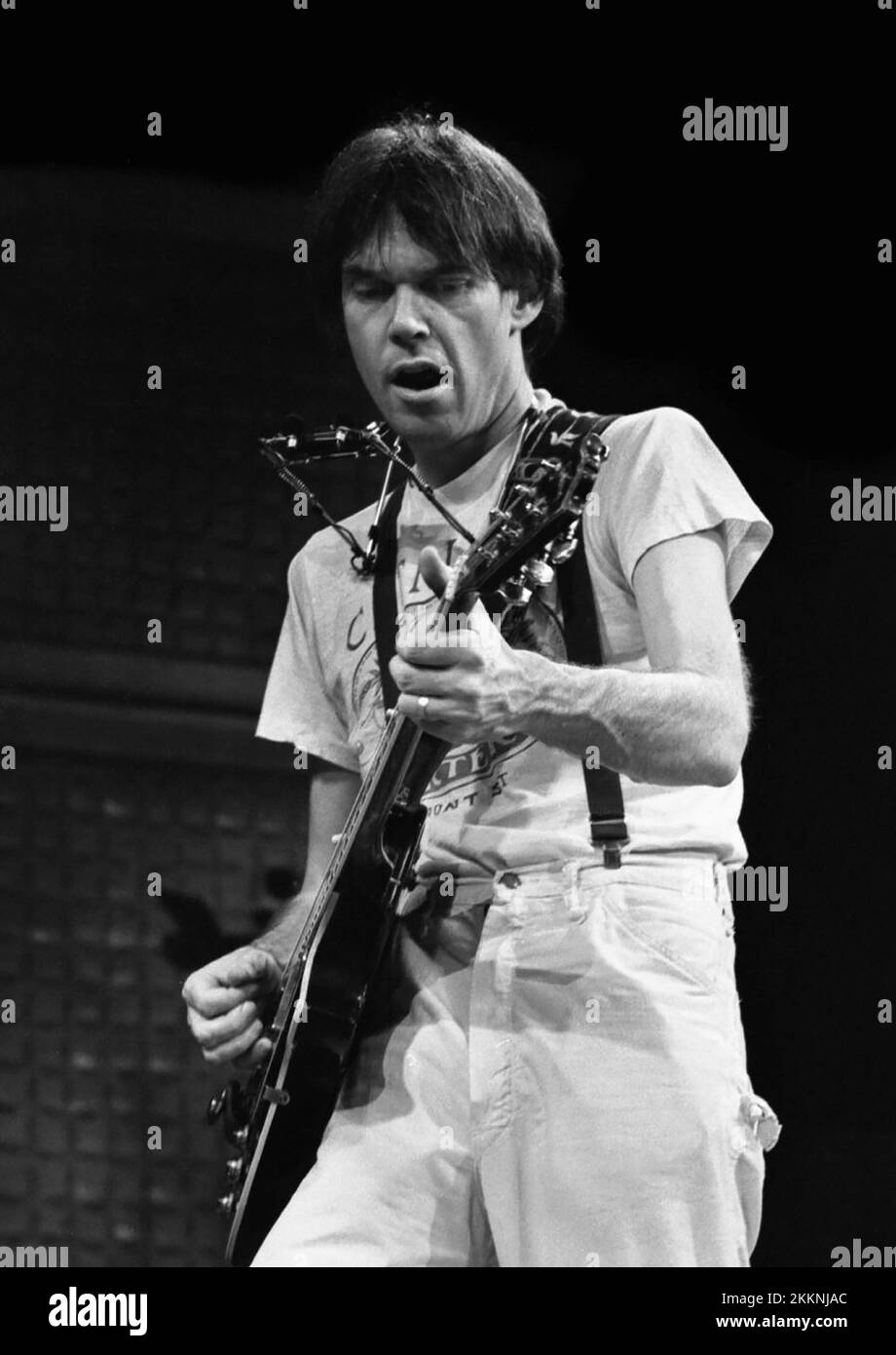 Neil Young with Crazy Horse in concert during the Rust Never Sleeps Tour at the Dane County Coliseum in Madison Wisconsin in 1978. Stock Photo