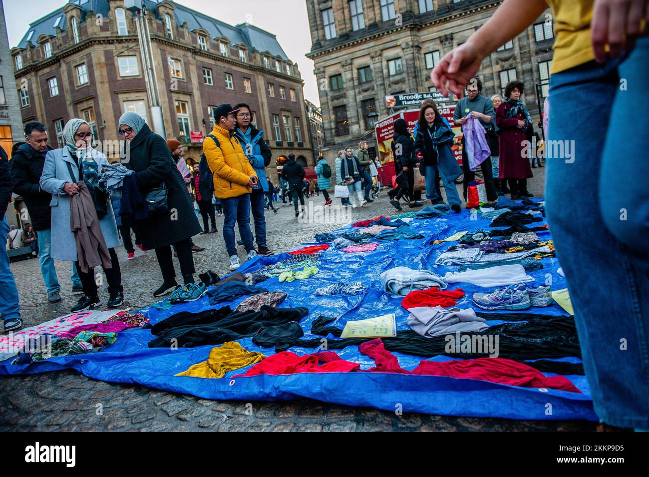 Amsterdam, Netherlands. 25th Nov, 2022. People take a look at the free second hand clothes