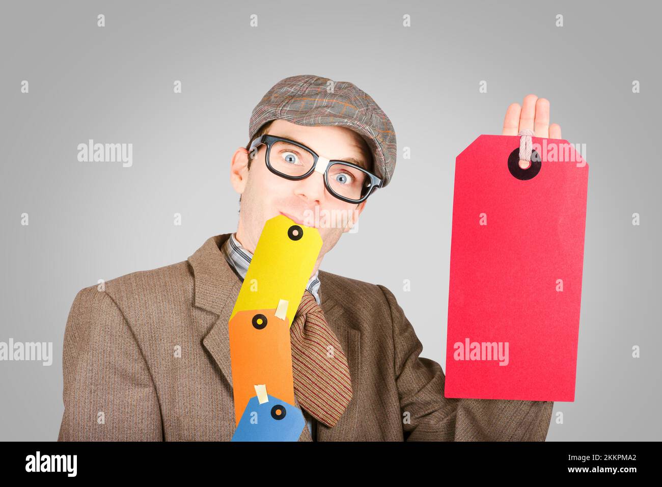 Funny marketing and sales businessman selling discounts with retail copyspace store labels. Sale