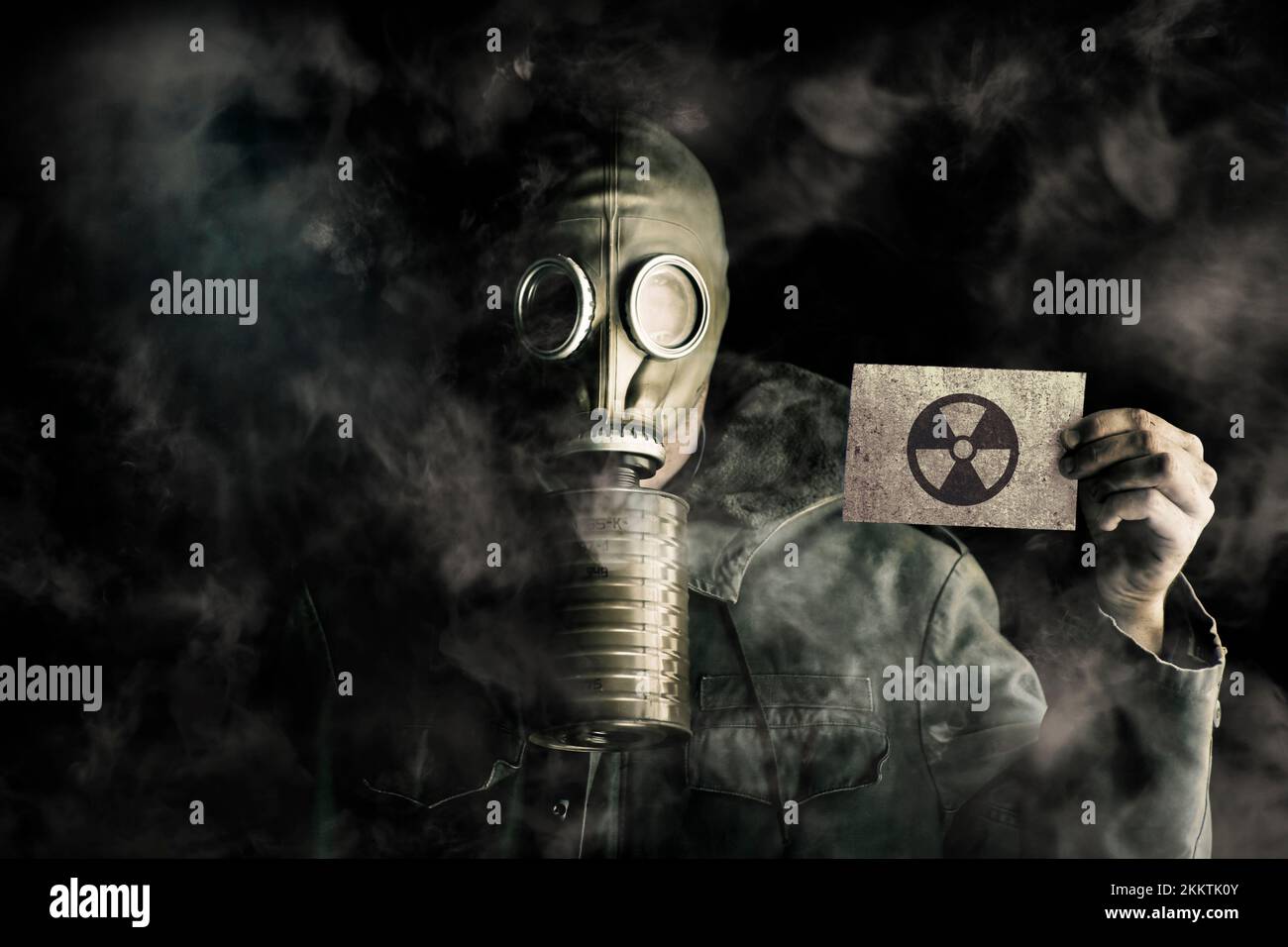 Nuclear threat conceptual with a soldier holding the tags for the MIC war calling card Stock Photo