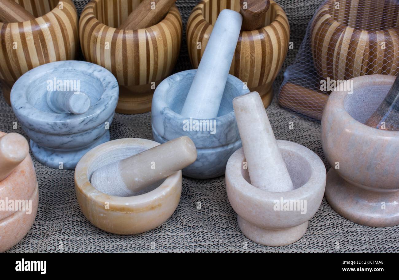 Wooden mortars and pestles as a traditional kitchenware Stock Photo Alamy