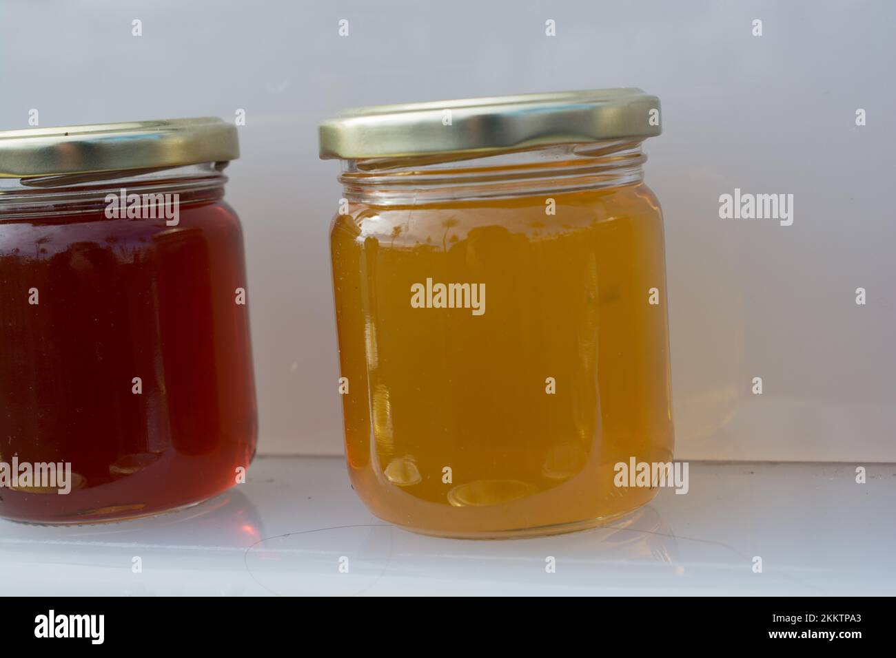 Glass jar of full of fresh honey with lid Stock Photo Alamy