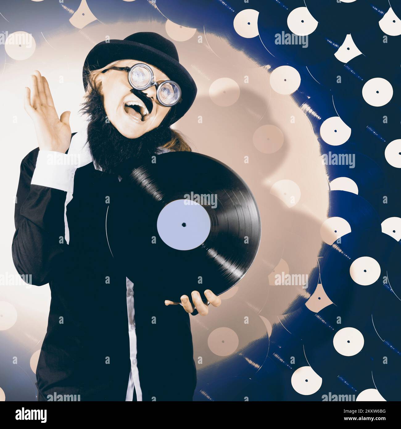 Upbeat music man dancing to songs being played from vintage vinyl