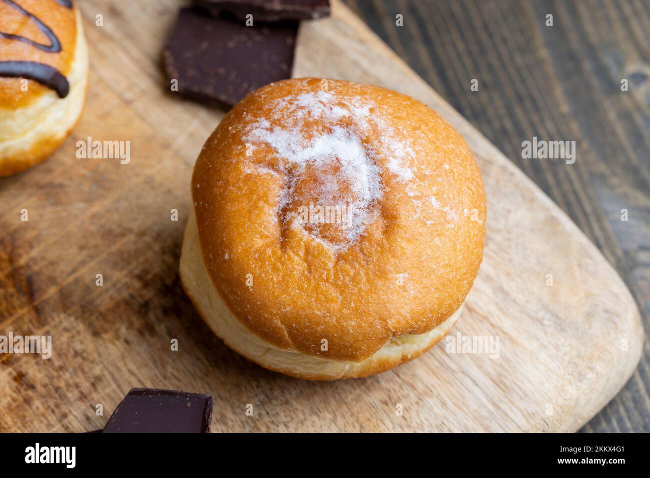 Yeast sweet donuts stuffed with boiled condensed milk , sweet donuts