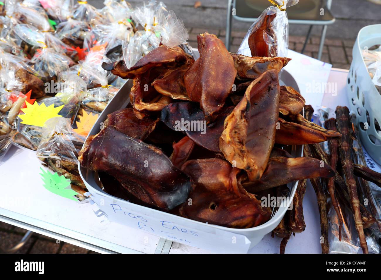 Pigs ears for sale on a market stall in Lee-on-Solent, Hampshire, UK. Stock Photo