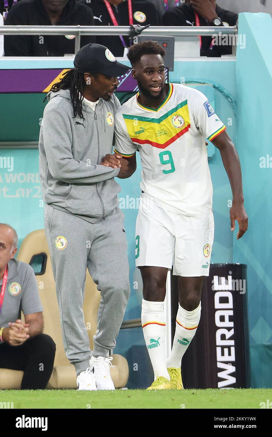 Doha, Qatar. 25th Nov, 2022. Boulaye Dia of Senegal celebrates his goal with Coach of Senegal Aliou Cisse during the FIFA World Cup 2022, Group A football match between Qatar and Senegal on November 25, 2022 at Al Thumama Stadium in Doha, Qatar - Photo: Jean Catuffe/DPPI/LiveMedia Credit: Independent Photo Agency/Alamy Live News Stock Photo