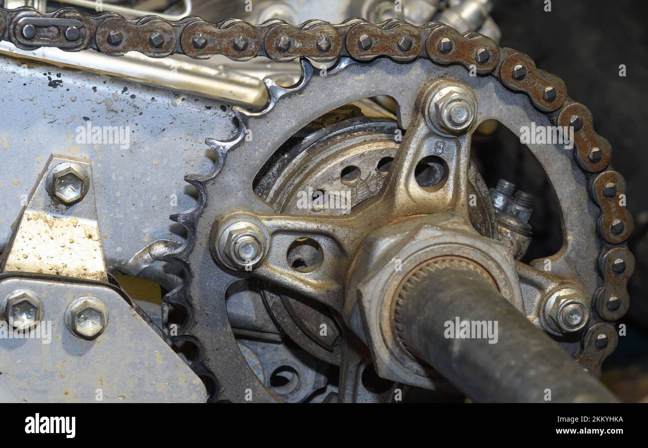 Detail of the transmission chain of a quad Stock Photo Alamy