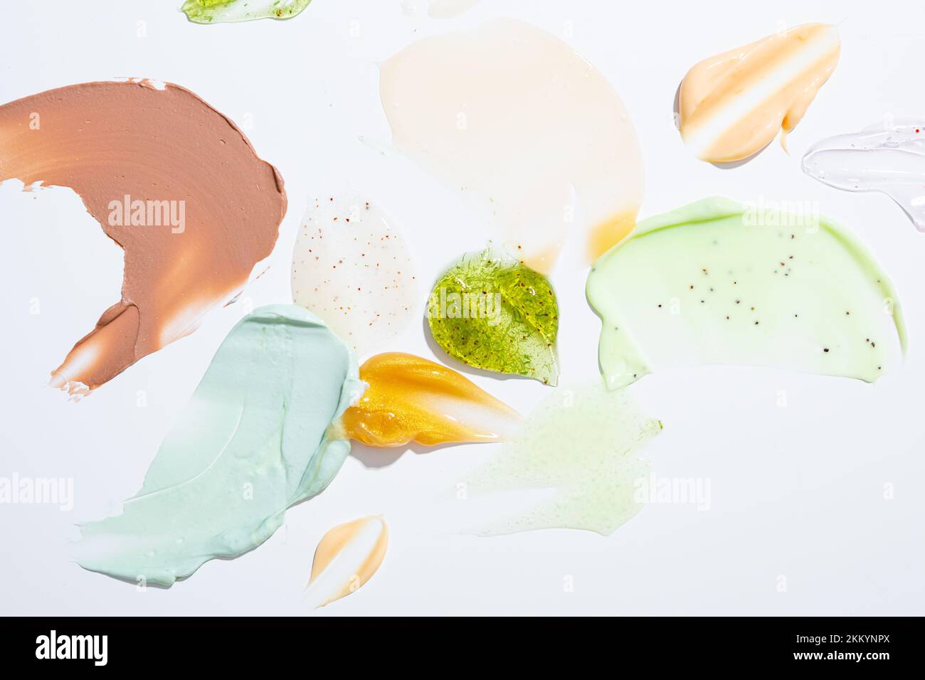 Cosmetic creme swatches and smears on light surface Stock Photo