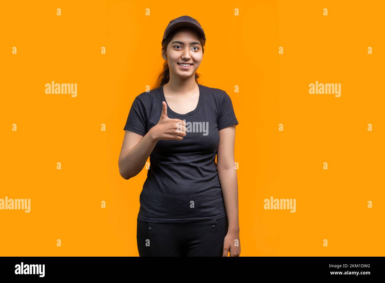 Woman showing one thumb hi-res stock photography and images - Alamy