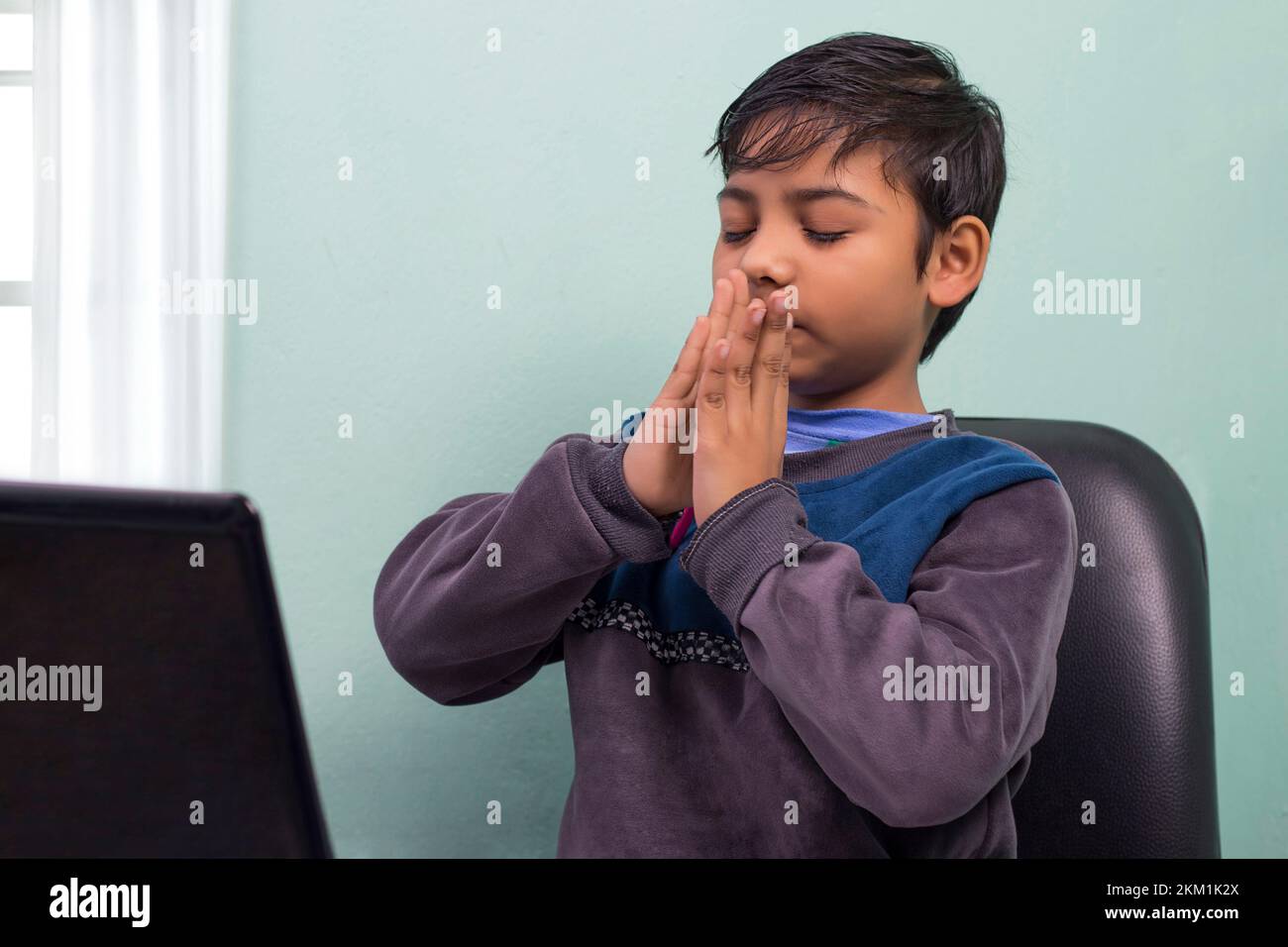 Kid praying with one adult hi-res stock photography and images - Alamy