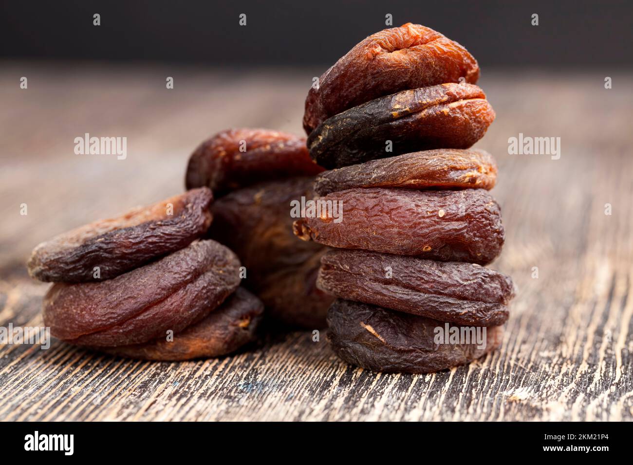 dark dried apricots of large size, dried apricots in sunlight with