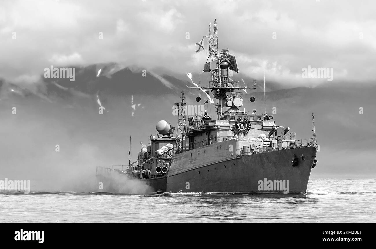 Russian warship going along the coast of Kamchatka Stock Photo