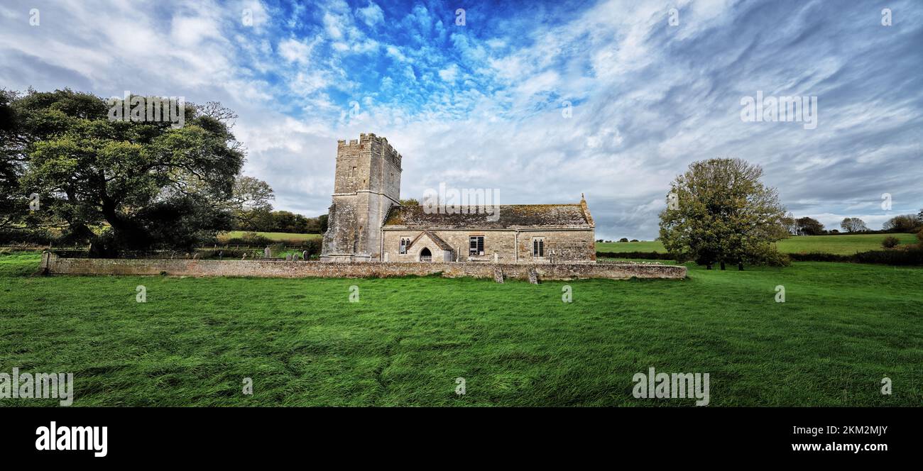 Panorama of Whitcombe church, in the parish of Whitcombe, Dorset, England. Dating from the 12th Century, this medieval church is in the Norman style. Stock Photo
