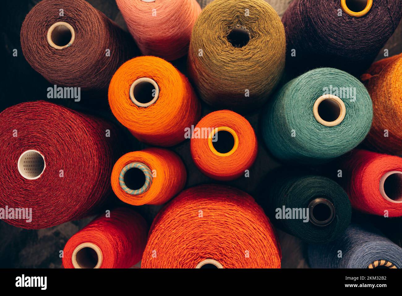 Composition of colorful vibrant wool threads from above. Autumn colours ...