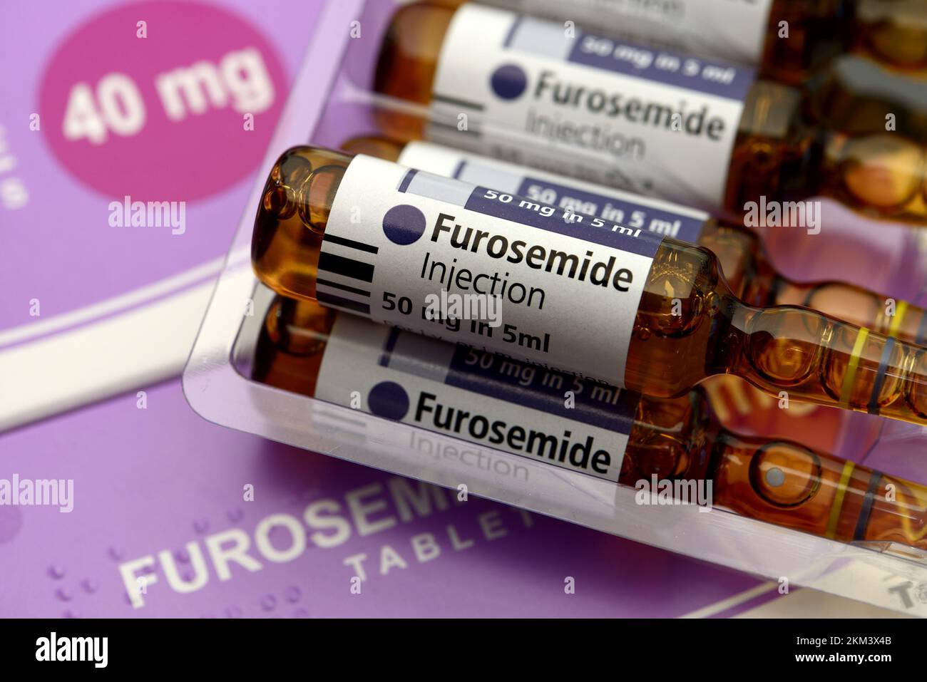 Furosomide - medicine to treat high blood pressure and oedema. 50mg phials of the liquid drug for injesction or intravenous delivery and 40mg tablets Stock Photo