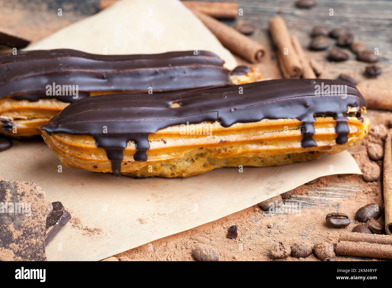 chocolate covered custard eclair with creamy chocolate cream, custard