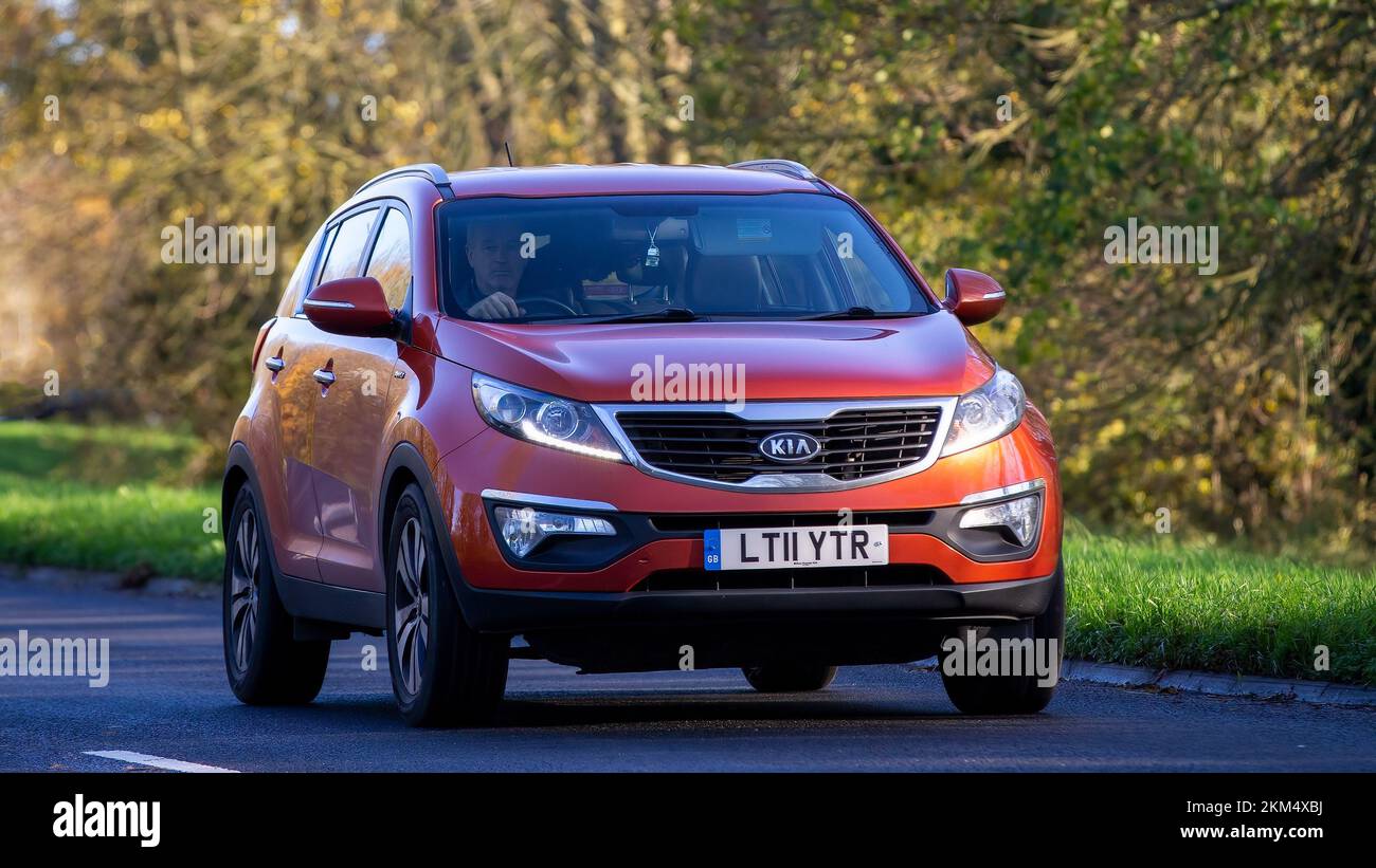 2011 orange diesel engine Kia Sportage car Stock Photo Alamy
