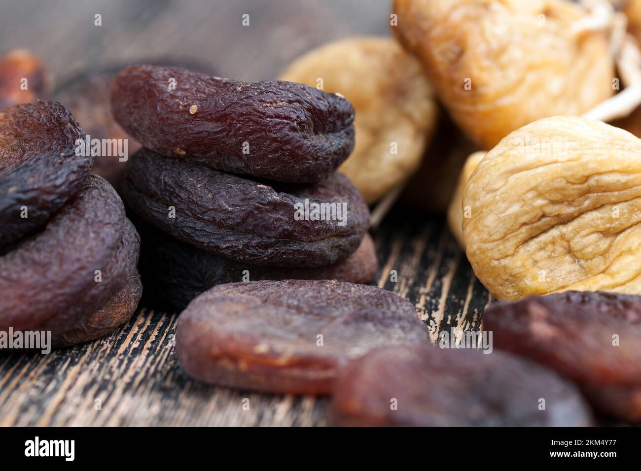 dark dried apricots of large size, dried apricots in sunlight with