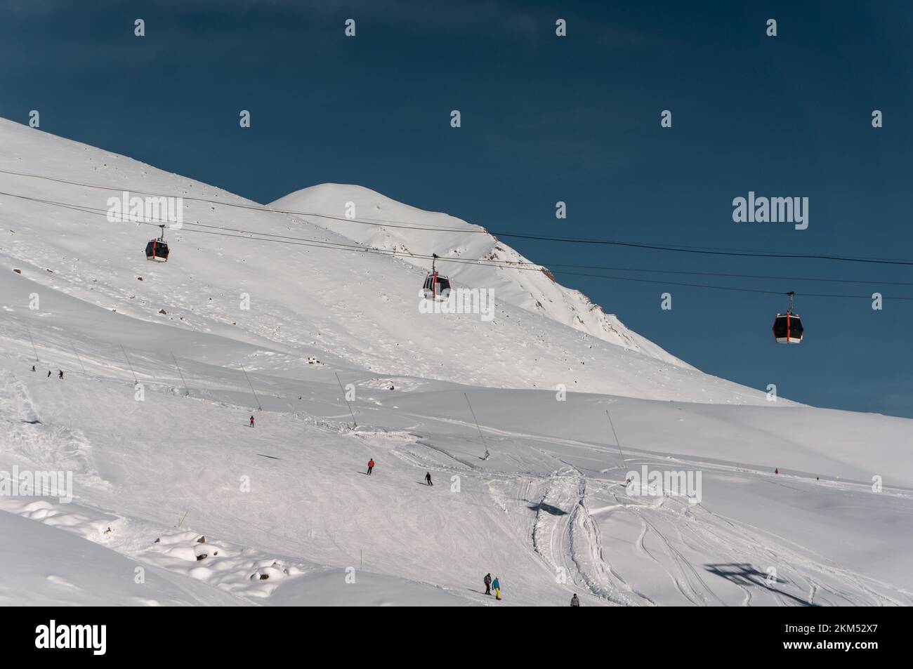 skiers and snowboarders on ski lift at winter at resort Stock Photo - Alamy