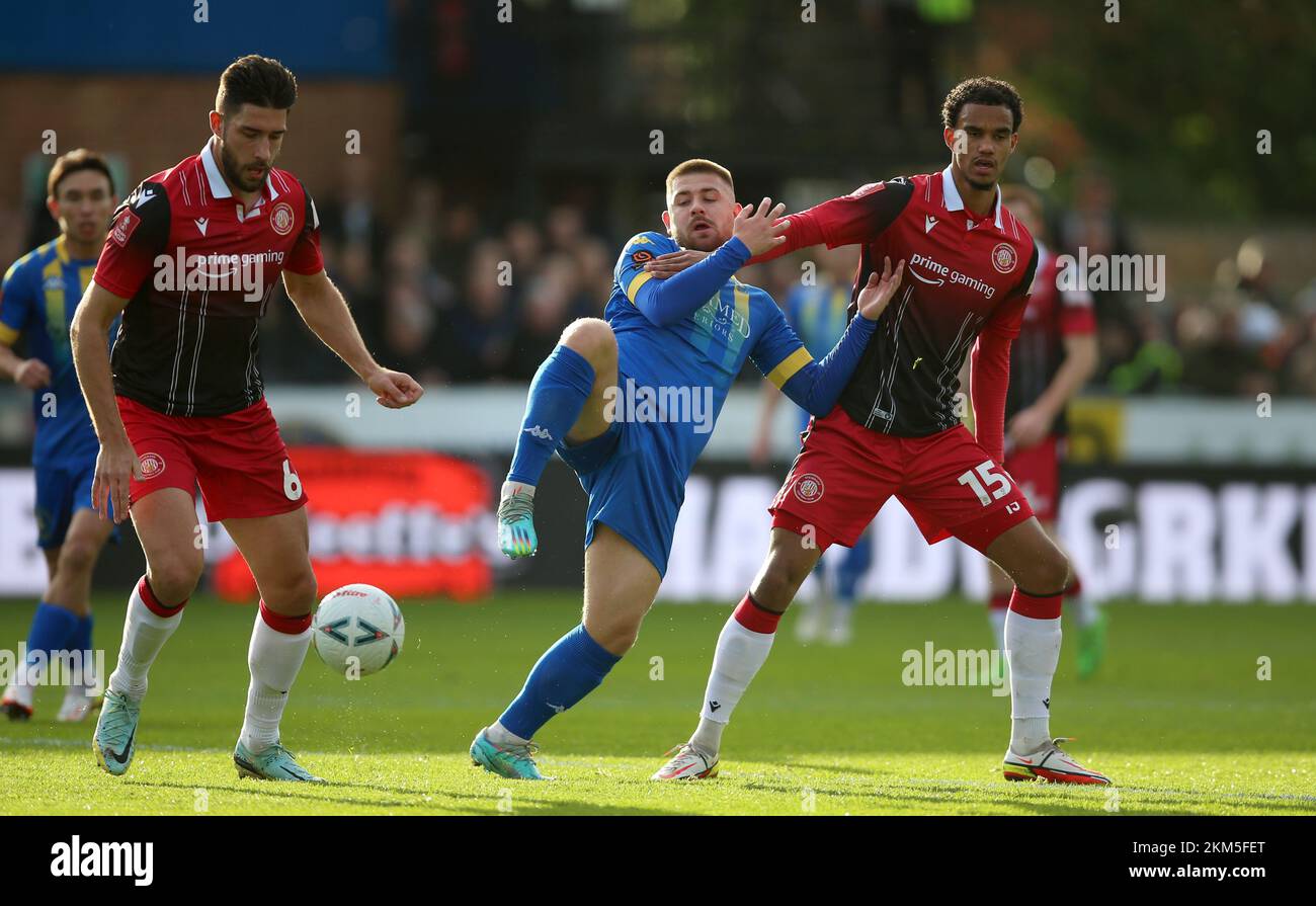 King's Lynn Town's Josh Barrett (centre) battles for the ball with Stevenage's Dan Sweeney (left) and Terence Vancooten during the Emirates FA Cup second round match at The Walks Stadium, King's Lynn. Picture date: Saturday November 26, 2022. Stock Photo