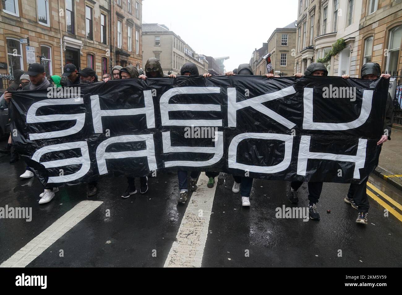 People take part during a anti-racism and anti-fascist march in Glasgow, organised by the Scottish Trade Unions Congress (STUC), as part of the annual St Andrew's Day march and rally. Picture date: Saturday November 26, 2022. Stock Photo