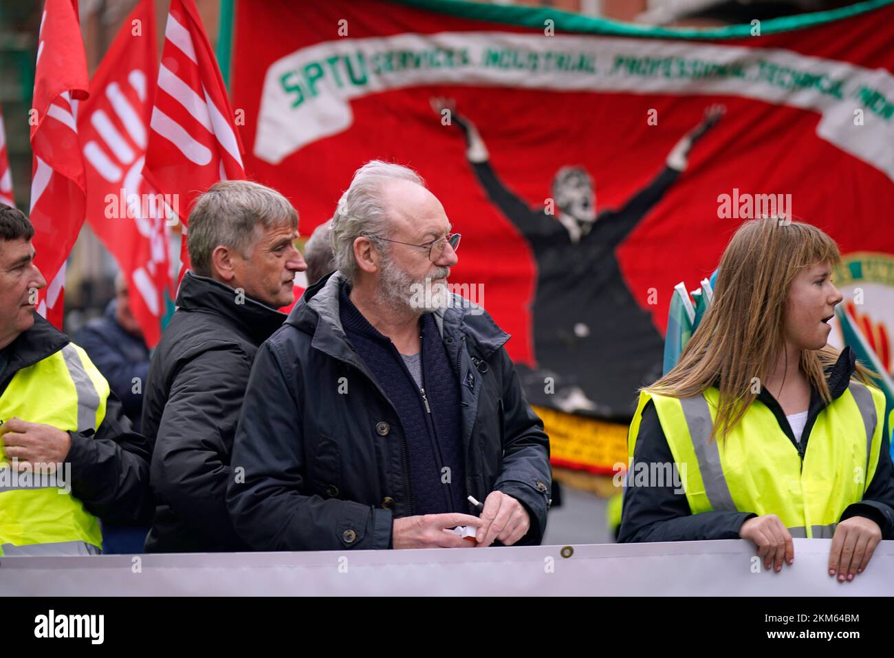 Actor Liam Cunningham in front of a James Larkin banner during a Raise the Roof rally in Dublin. The protest is over the country's ongoing housing crisis. Picture date: Saturday November 26, 2022. Stock Photo