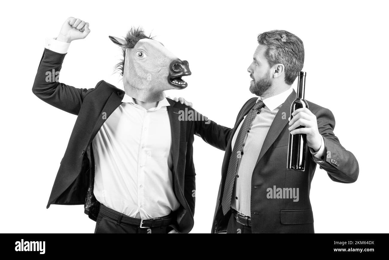 Businessman in horse head mask punch drunk man on corporate party isolated on white, conflict Stock Photo