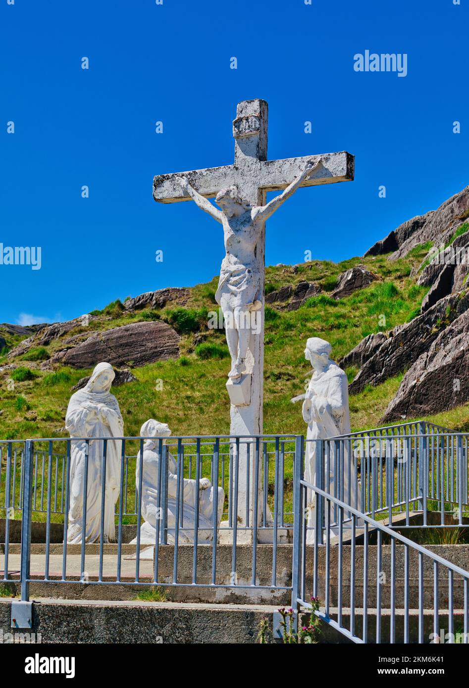 Calvary sculpture group Christ on cross on the Wild Atlantic Way, Healy Pass, Caha Mountains, Beara Peninsula, County Cork, Ireland Stock Photo