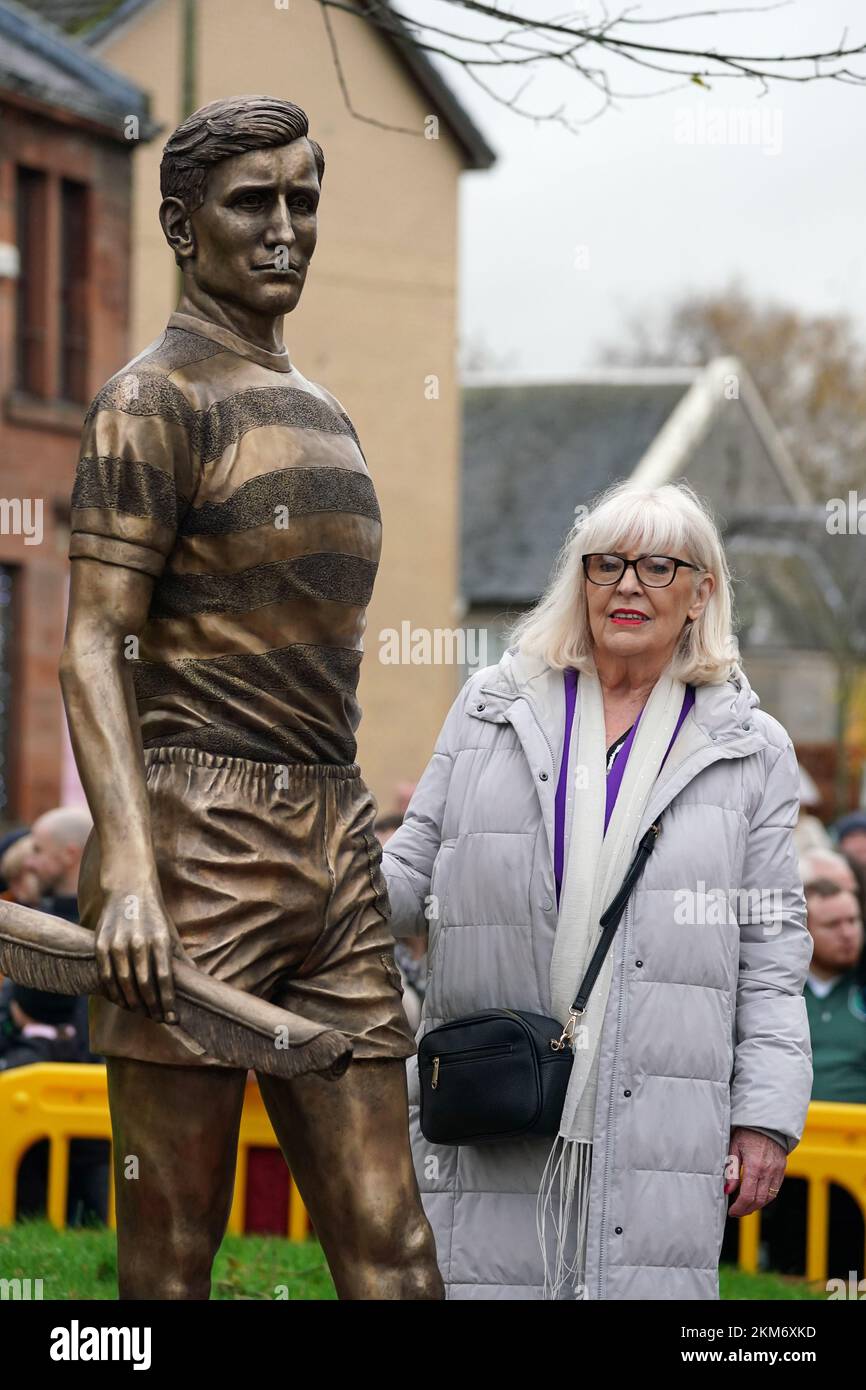Liz McNeill stands beside a bronze statue of her husband and former Celtic captain and manager Billy McNeill as its unveiled by members of the Billy McNeill Commemoration Committee, in his home town of Bellshill near Glasgow. Picture date: Saturday November 26, 2022. Stock Photo
