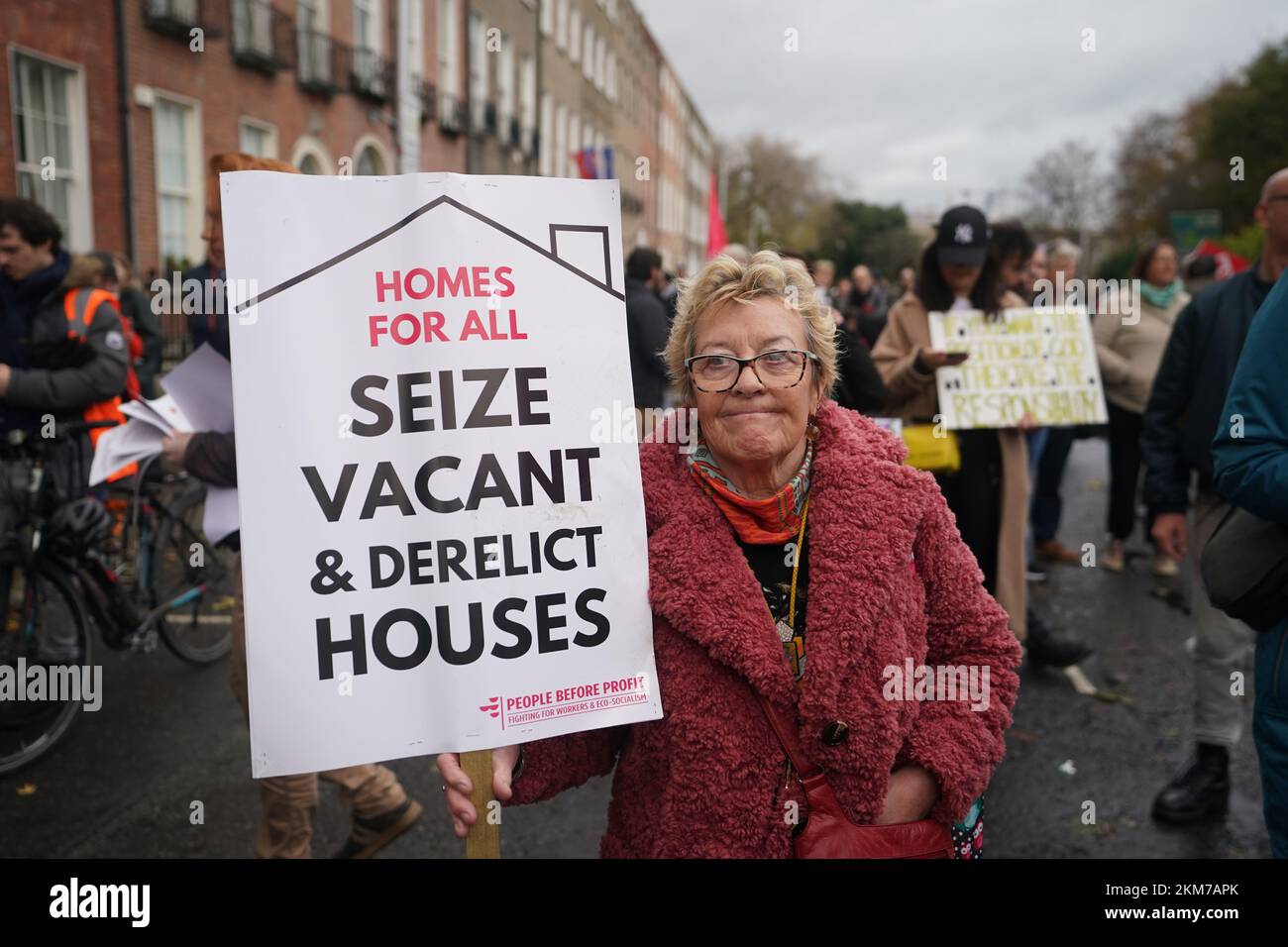 A woman takes part in a Raise the Roof rally in Dublin. The protest is over the country's ongoing housing crisis. Picture date: Saturday November 26, 2022. Stock Photo