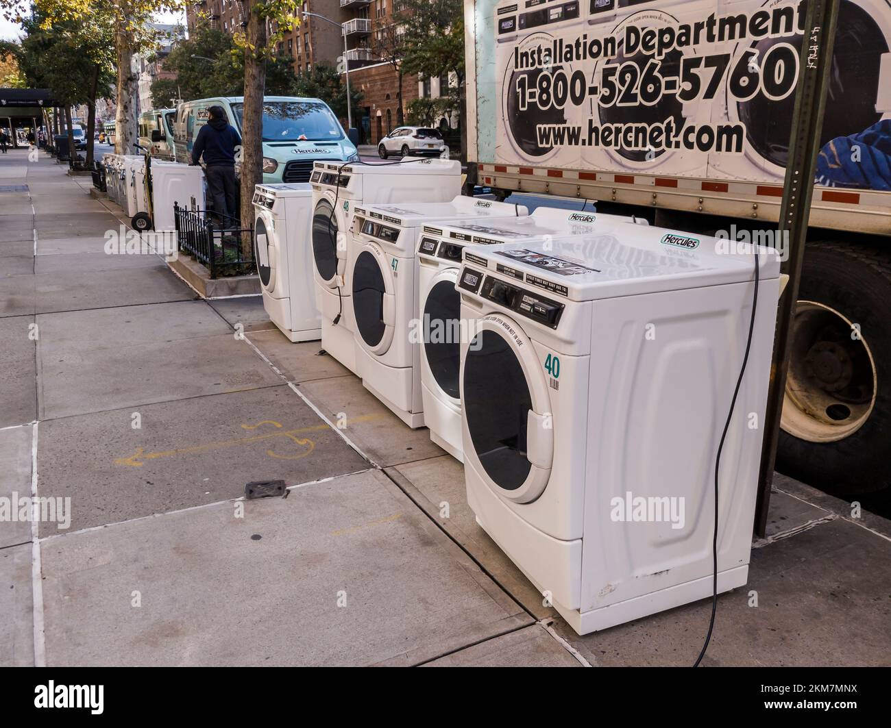 A delivery of Maytag brand washing machines to an apartment building in