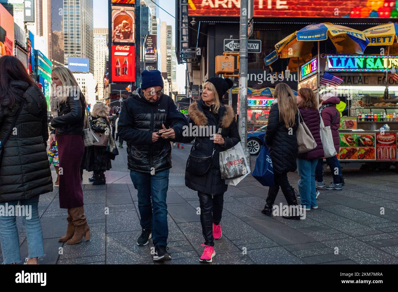 Tourists in Times Square in New York on Sunday, November 20, 2022. (© Richard B. Levine) Stock Photo