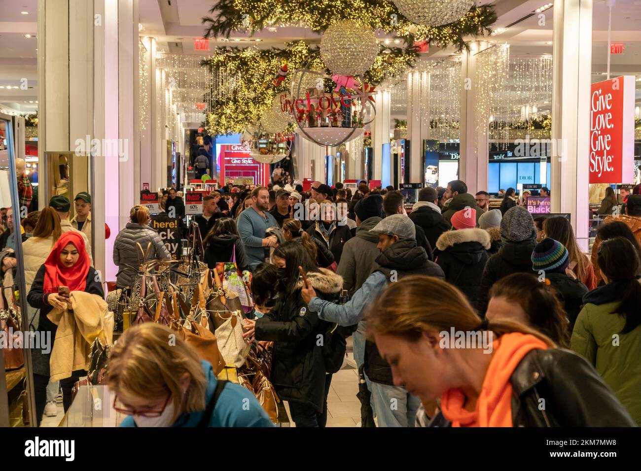 Hordes of shoppers throng the Macy's Herald Square flagship store in New York anxious to shop on the day after Thanksgiving, Black Friday, November 25, 2022. The National Retail Federation predicts 166.3 million people will shop over the Black Friday weekend culminating in Cyber Monday. (© Richard B. Levine) Stock Photo