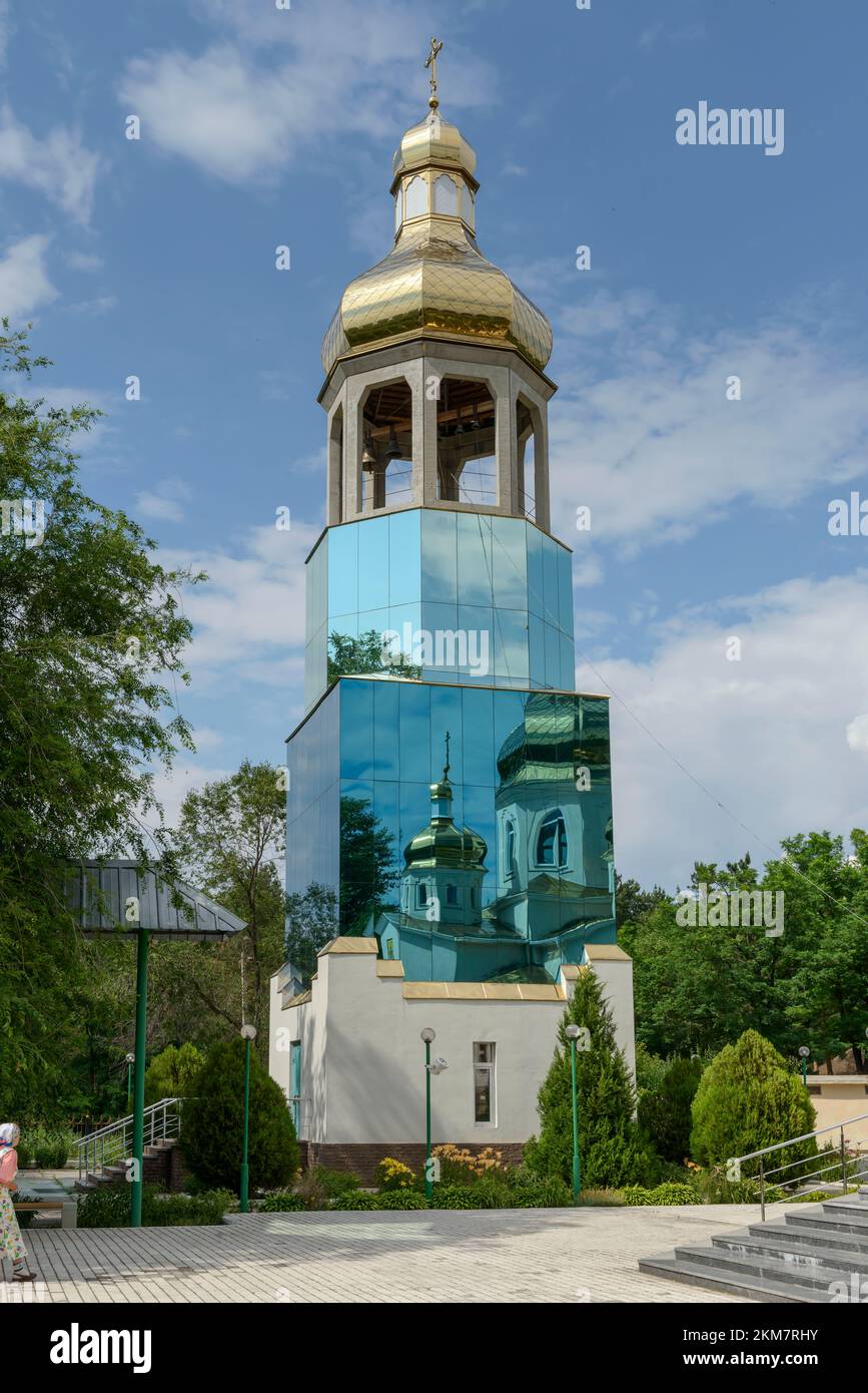 Bell tower of temple in honor of the Exaltation of the Honorable and Life-Giving Cross of the Lord in Obukhovka, Dnepropetrovsk region, Ukraine. Stock Photo