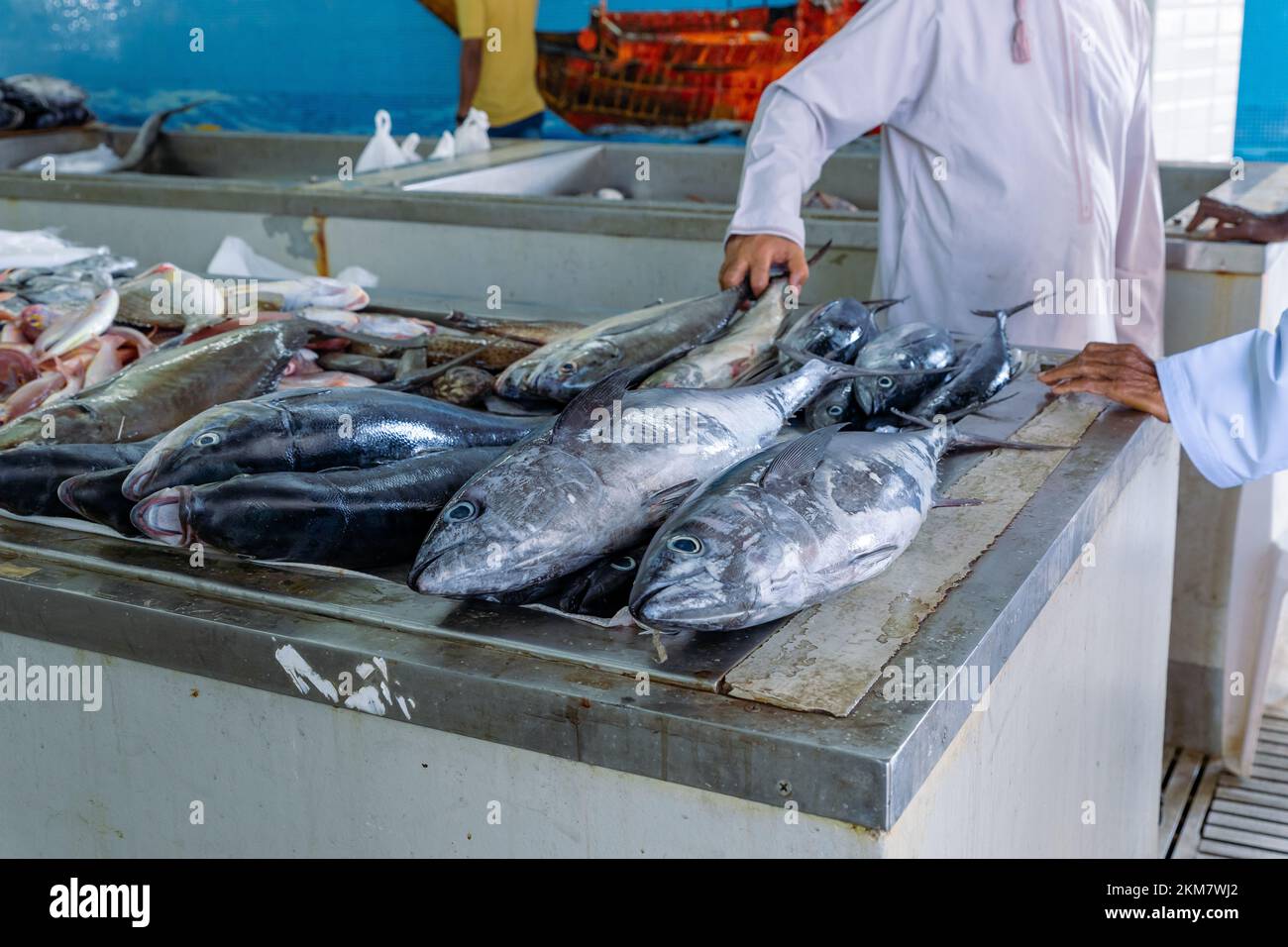 MUTRAH, OMAN NOVEMBER 14, 2022 Vendors selling tuna, sardines and