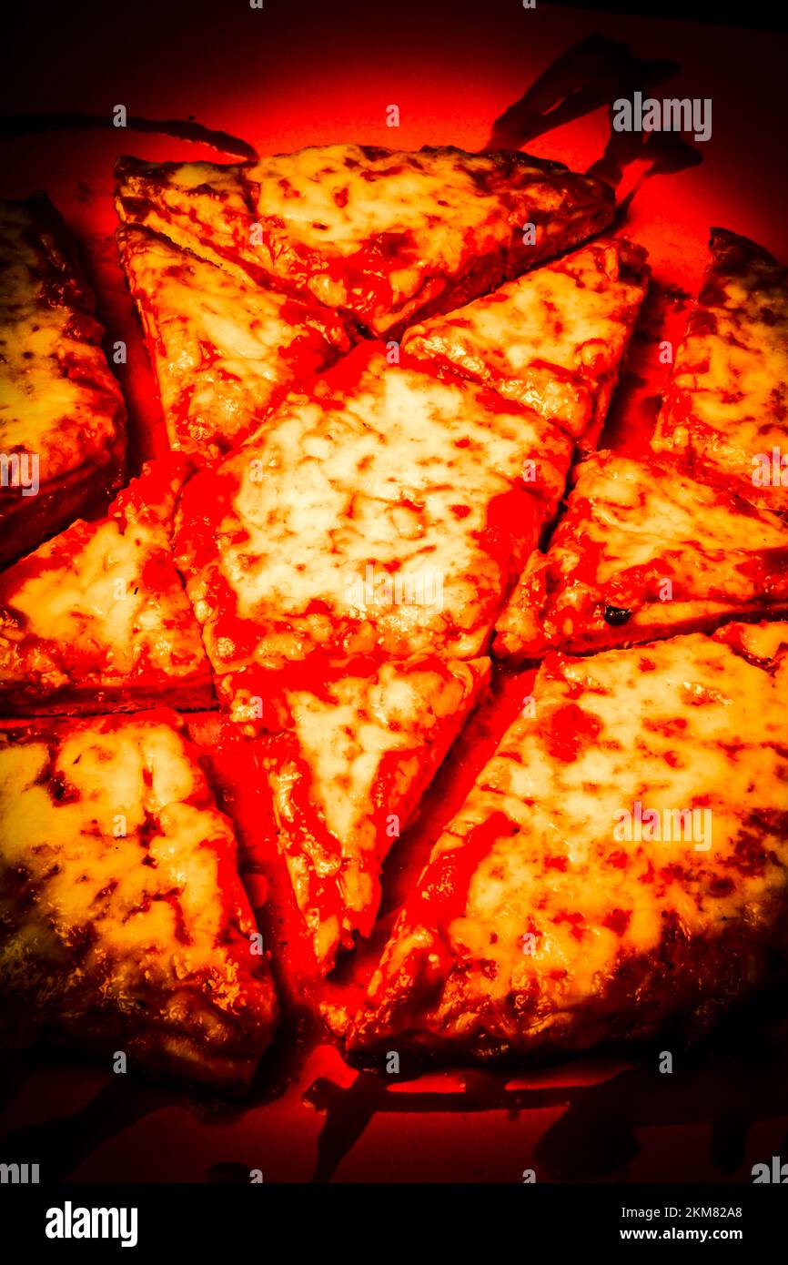Cursed cheese pizza sliced and diced in a rite o black magic. Demonic