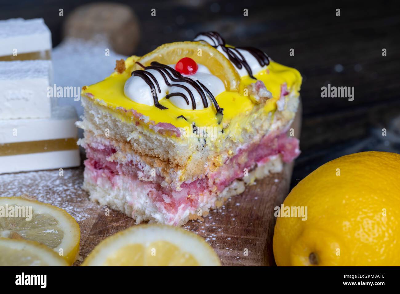 lemon strawberry cake made of several layers of cakes of different