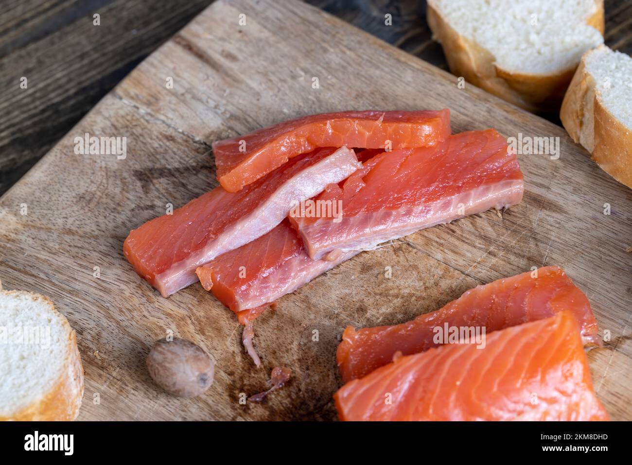 red salted salmon fish meat on a chopping board, salted salmon fish ...