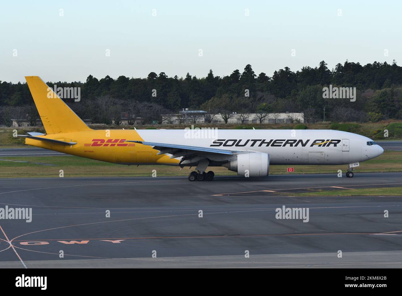 Chiba Prefecture, Japan - October 29, 2021: DHL Boeing B777F (N774SA) freighter. Stock Photo