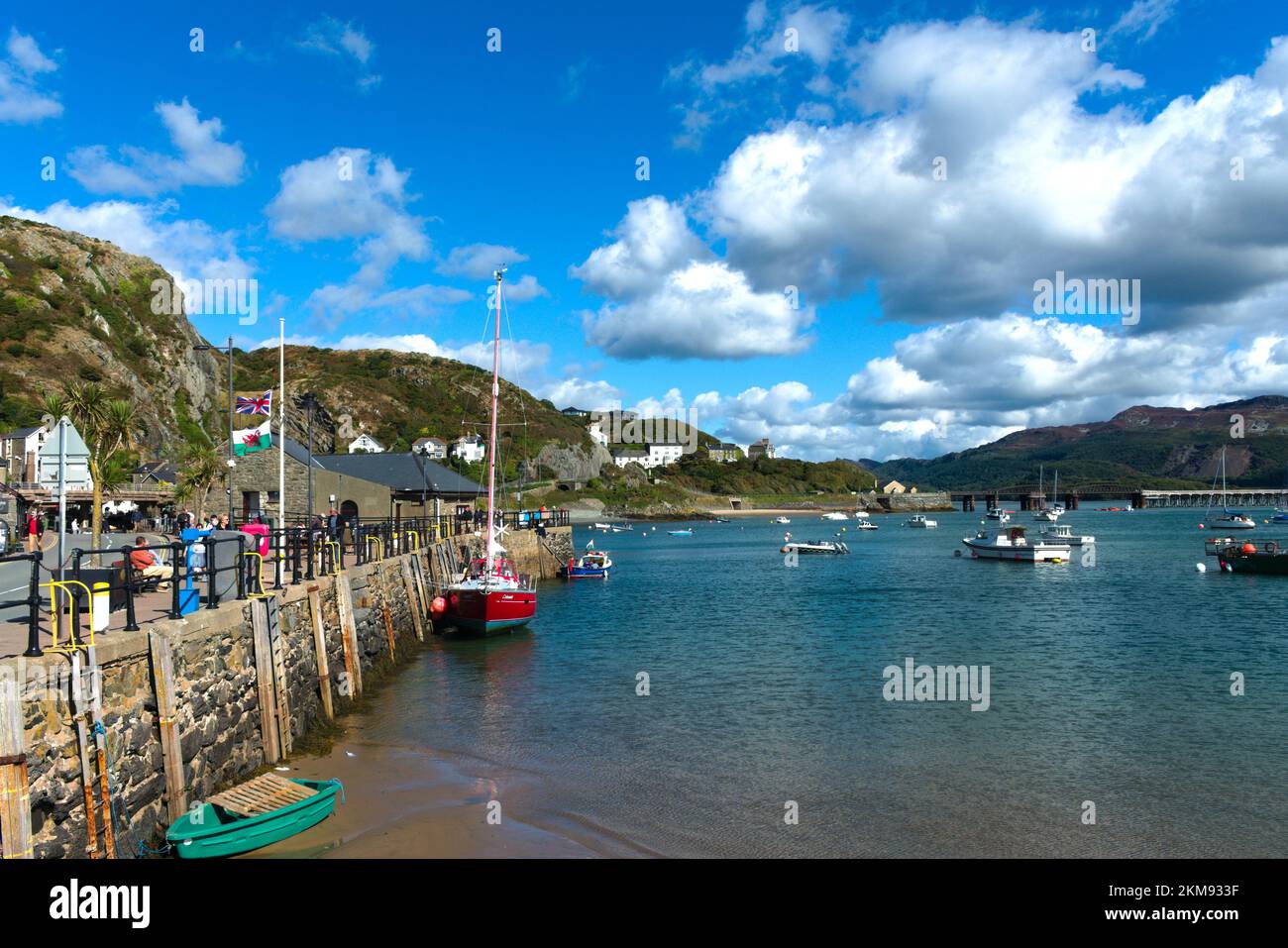 Barmouth -  Wales - September 16 2033:  Beautiful coastal town in Gwynedd, Snowdonia. Panoramic view of the harbour front. Small boats in the estuary. Stock Photo